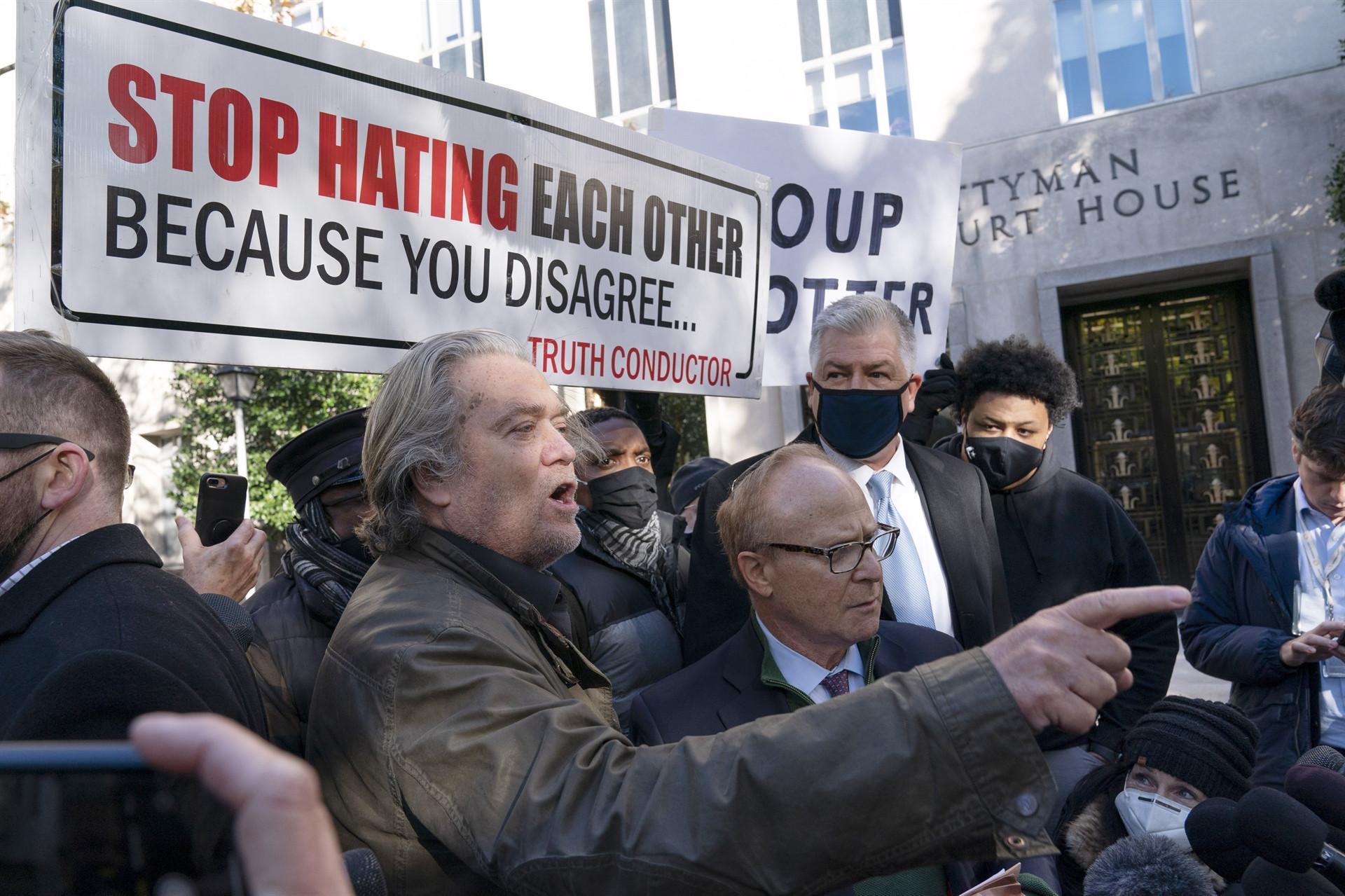 Trump ally Bannon surrenders to face Capitol riot probe charges
