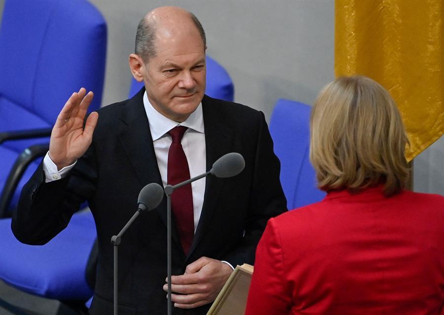 Scholz succeeds Merkel as German chancellor, opening new era