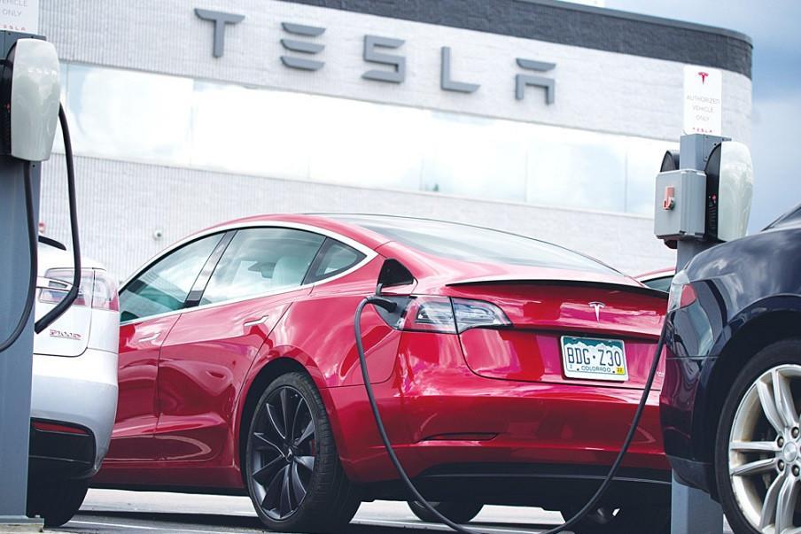 Tesla recalls 54,000 vehicles to fix ’rolling stop’ feature