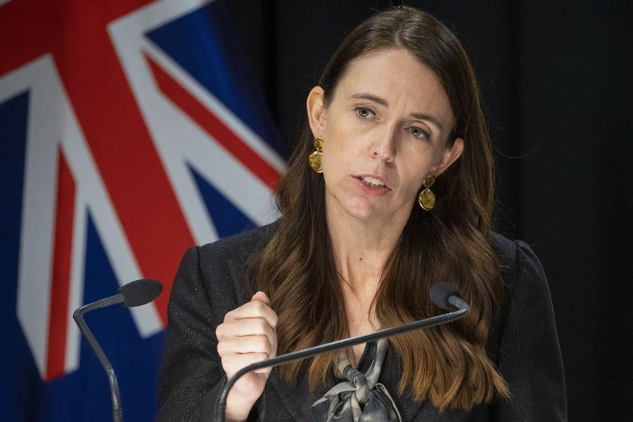 As virus cases go from 1 to 24,000, New Zealand changes tack