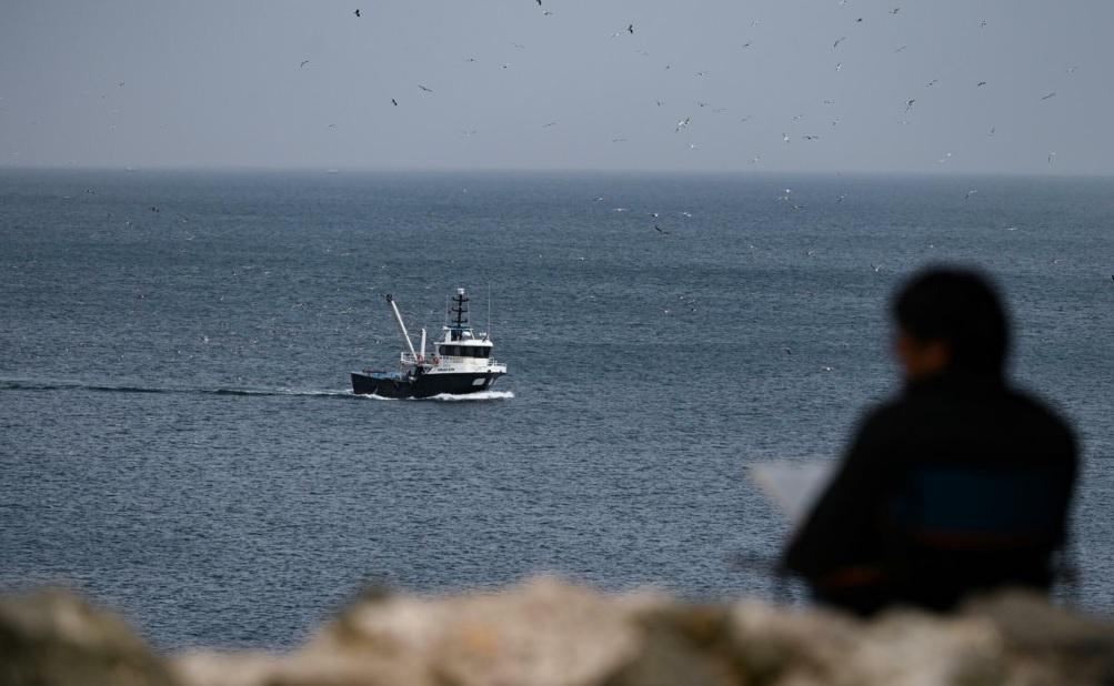 Turkish fishermen in Black Sea closely watch navy boats