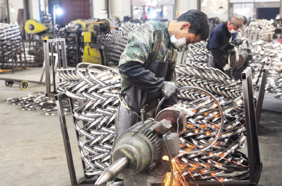 China’s economy grows still-weak 4.8 percent