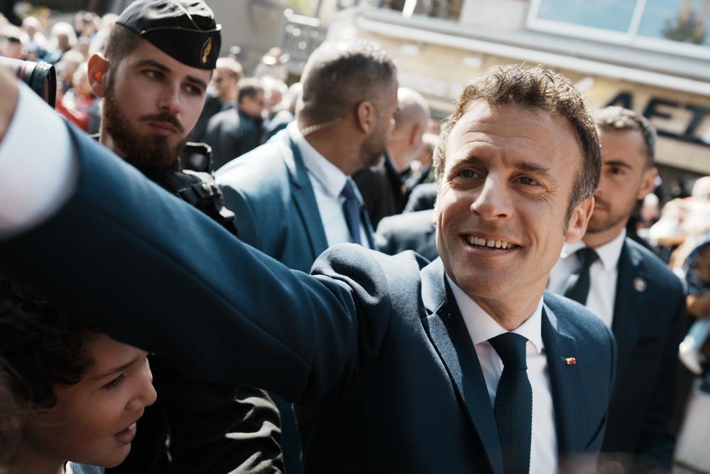 Macron seeks to heal French divisions after re-election
