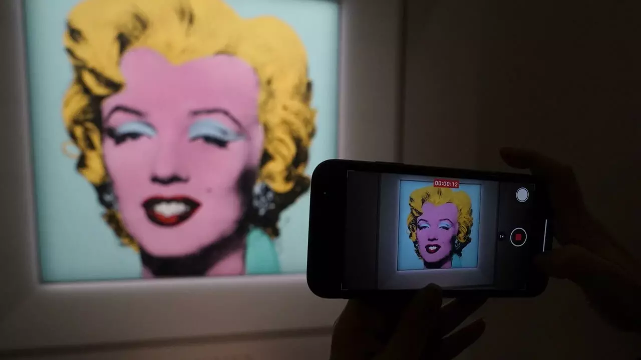 Warhol portrait of Marilyn Monroe fetches record $195 mn