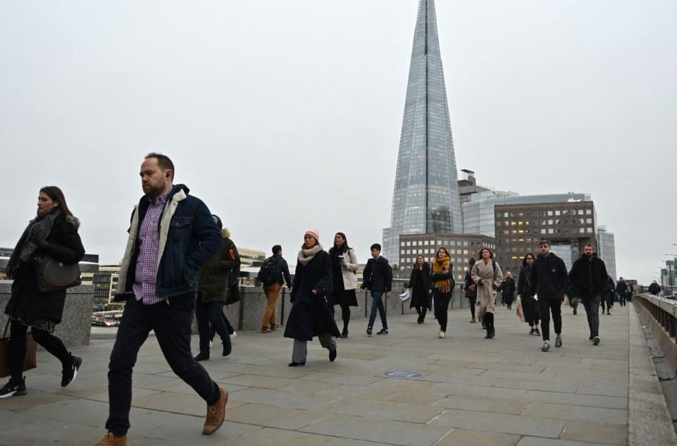 UK unemployment dips but wages hit by inflation