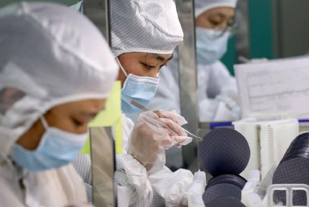 Global chip shortage likely to last through 2023: US official