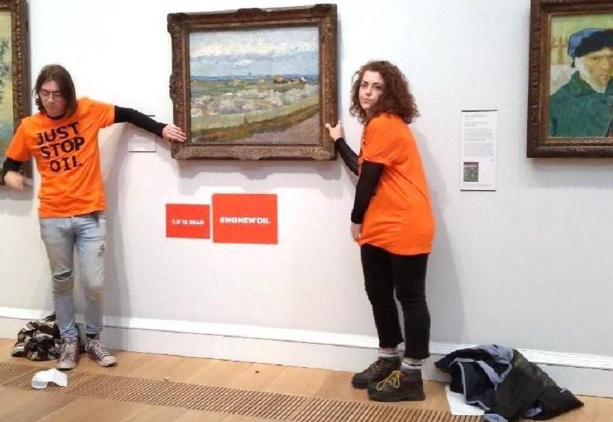 Climate activists glue hands to Van Gogh frame in London gallery