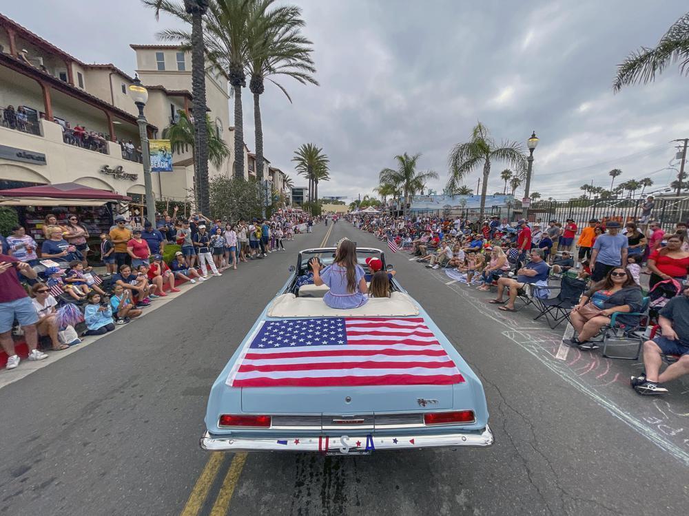 Uneasy US tries to fete a July 4 marred by parade shooting