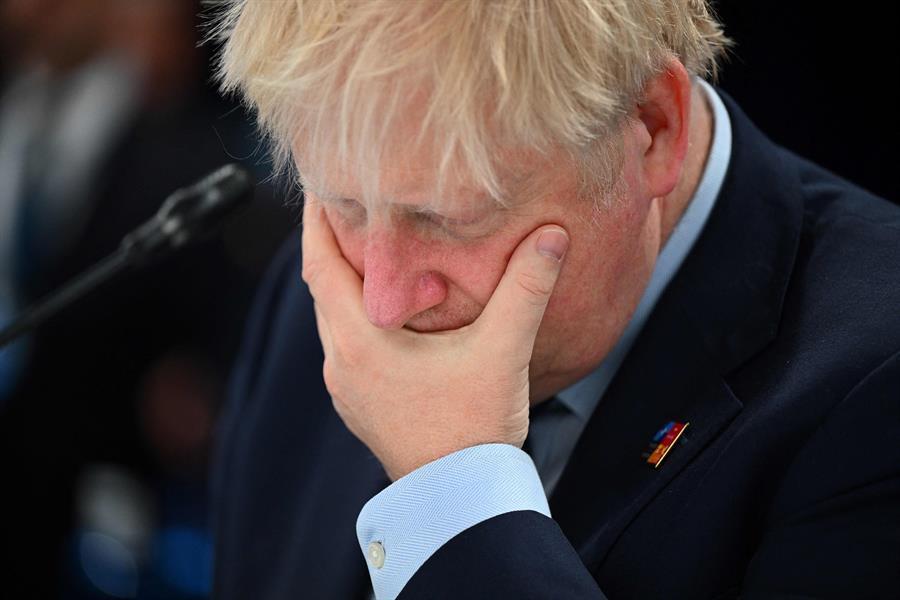 UK’s Johnson vows to stay in office after top ministers quit