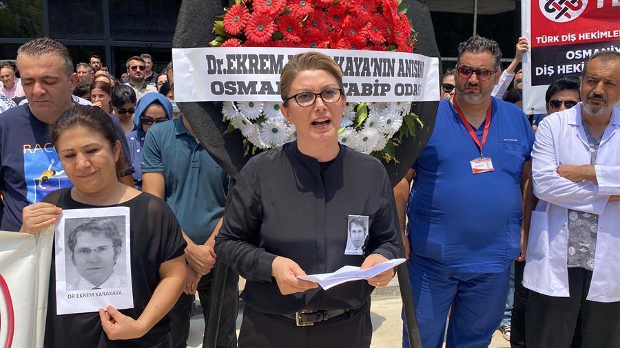 Healthcare workers walk out to protest killing of colleague