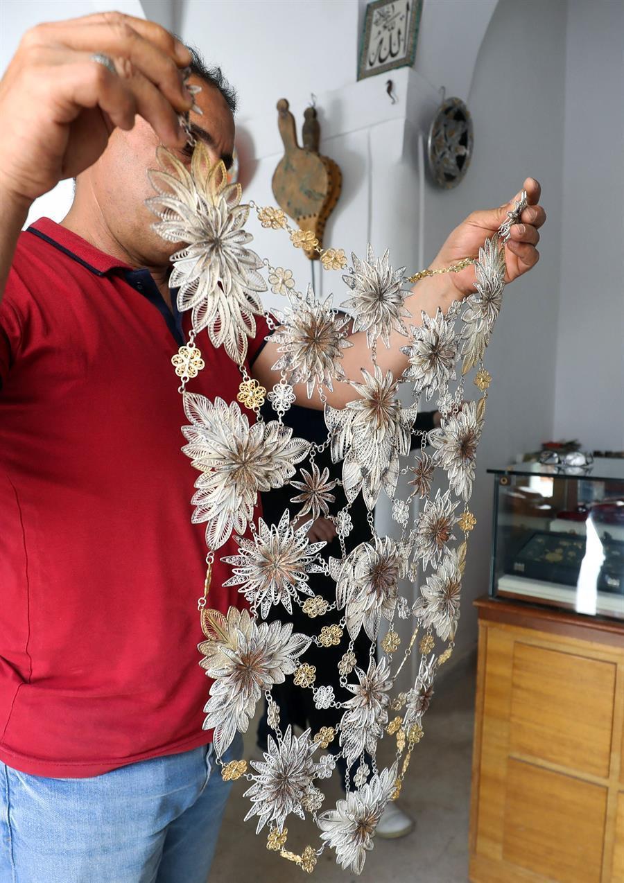 Libya traditional jewellery hangs on by silver thread