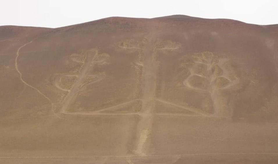 Tourists trample all over protected, prehistoric Peruvian hill carving