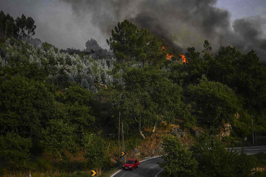 Wildfires blaze across sweltering southwest Europe