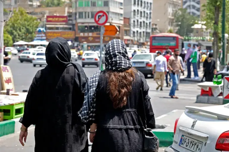 Iranian police fire tear gas at rally after woman’s funeral