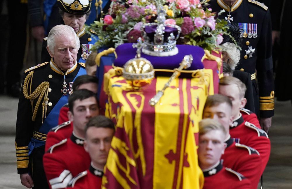 Queen put to rest with Philip, her parents in Windsor chapel
