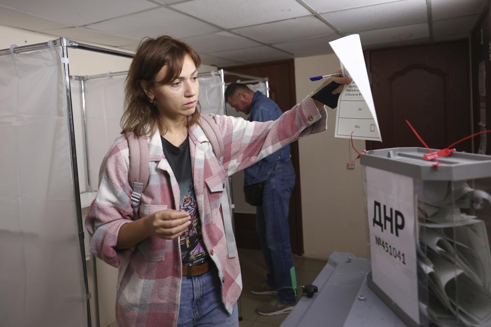 Kremlin stages votes in Ukraine, sees protests in Russia