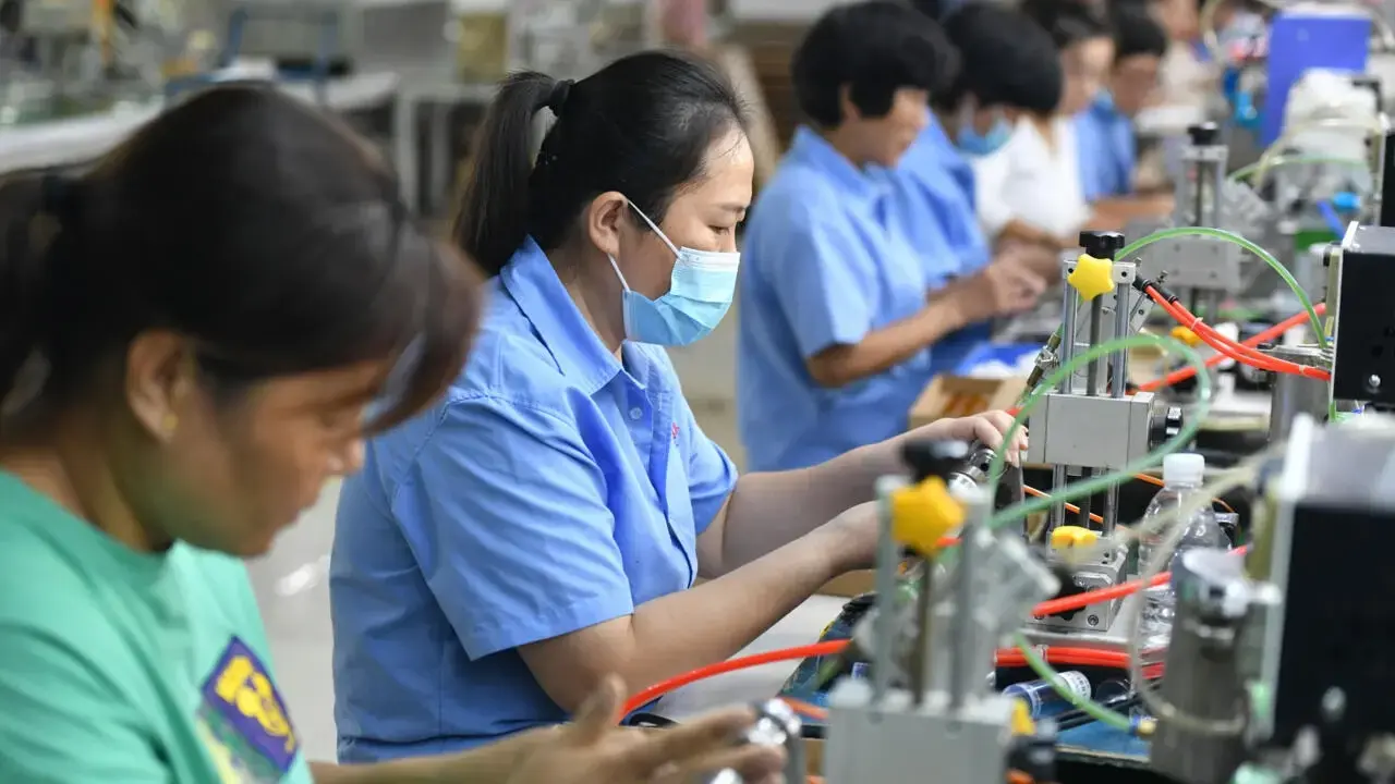 China’s factory activity contracts on Covid curbs