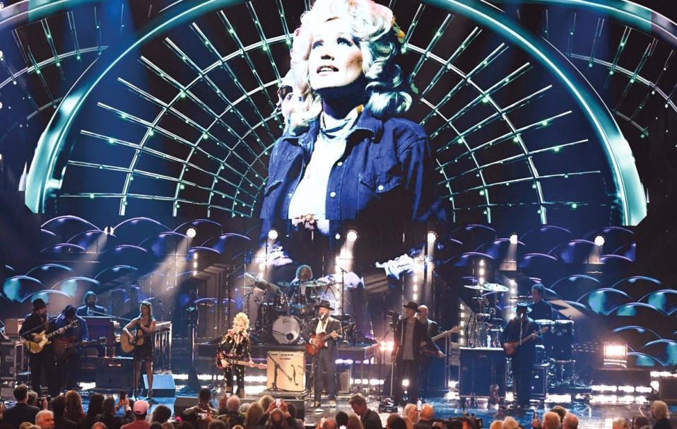 Eminem, Dolly Parton roll into Rock Hall