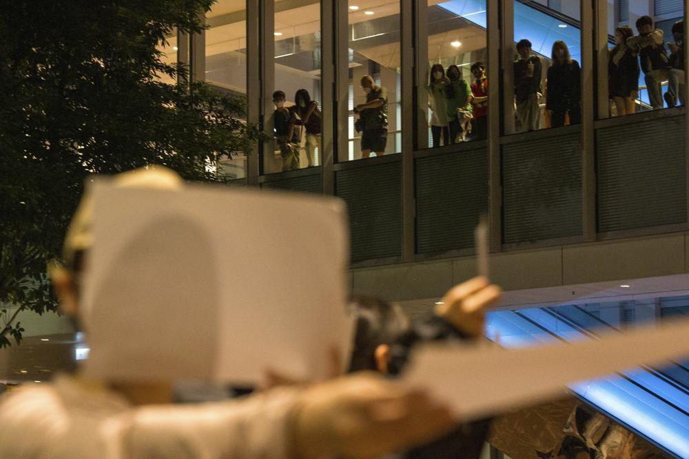 Hong Kong security chief warns against supporting China protests