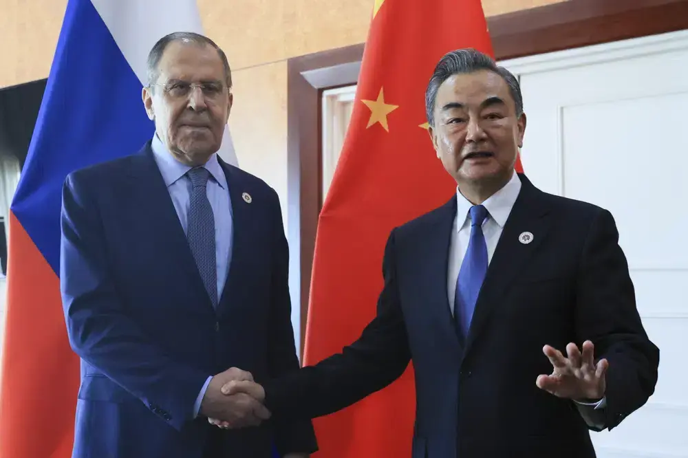 China S Foreign Minister Signals Deeper Ties With Russia World News