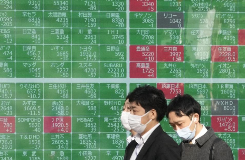 Tokyo shares close higher