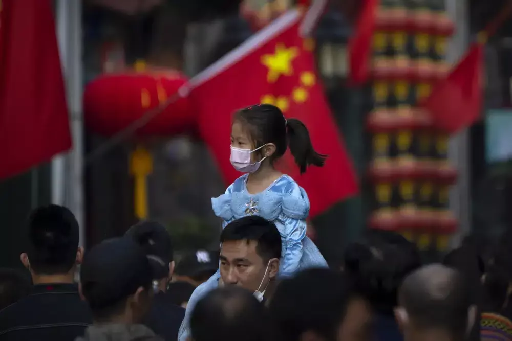 China records 1st population fall in decades as births drop