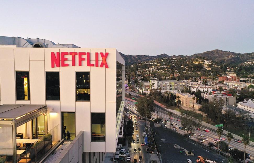 Netflix soars to 230 mln subscribers, co-founder steps down