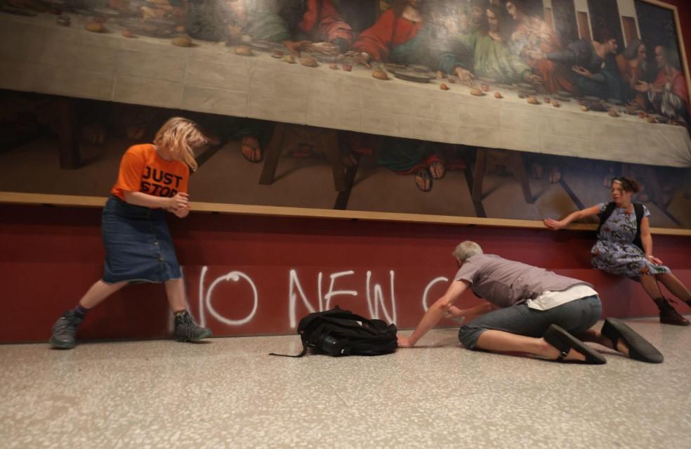 UK climate activists fined for da Vinci glue stunt