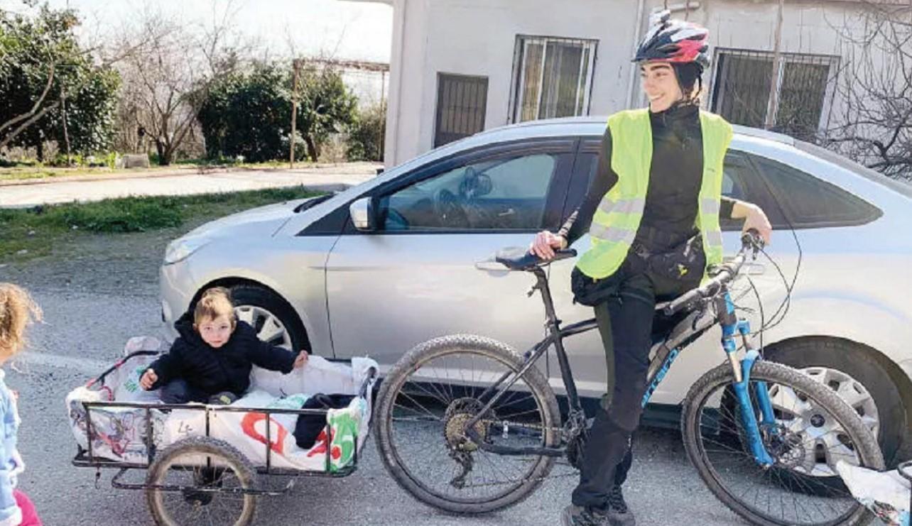 Cyclist student handing out ‘hope’ in quake zone