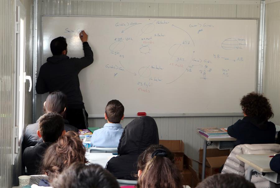 Teacher couple prepares quake-stricken students for exams in a container classroom
