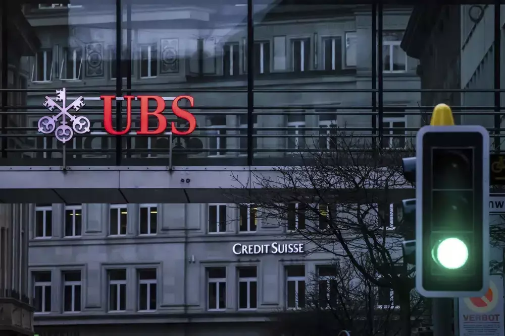 Up to 30 pct of jobs may go in UBS-Credit Suisse merger: Reports