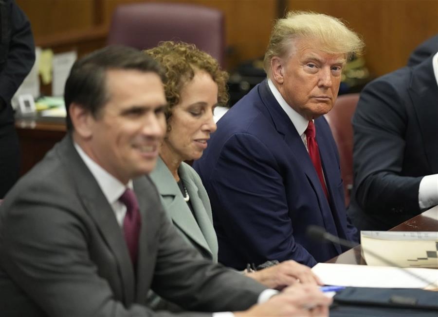Trump, stone-faced, pleads not guilty in historic court appearance