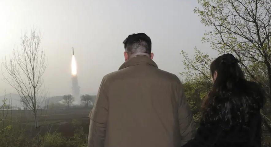 N Korea says it tested new solid-fuel long-range missile