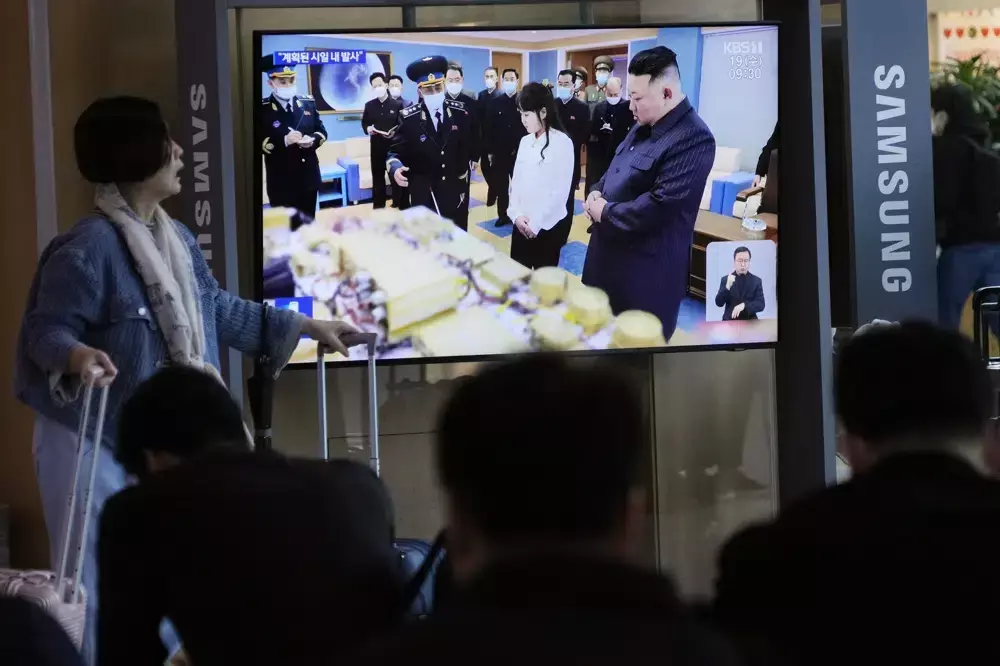 Kim says North Koreas 1st spy satellite is ready for launch