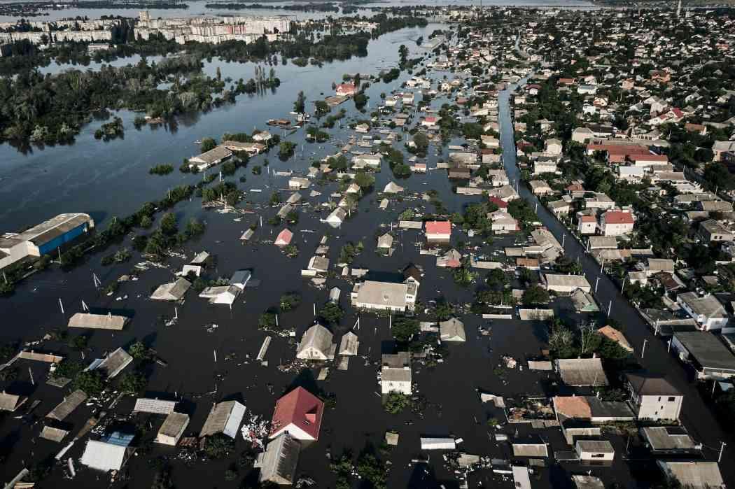 Russia shells Ukrainian city inundated by dam collapse