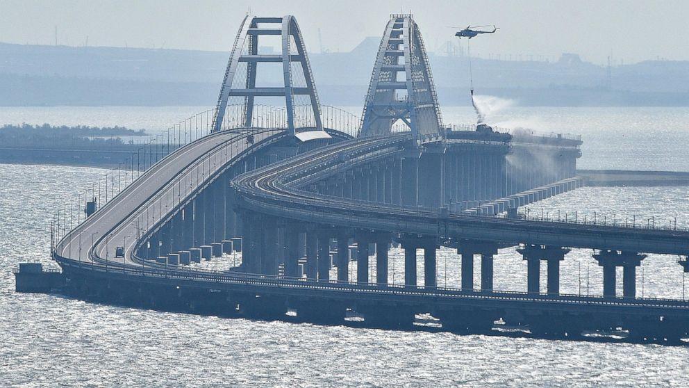Traffic on key bridge from Crimea to Russias mainland halted amid reports of explosions and deaths