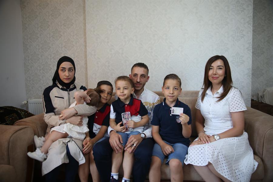 Family struggles to prove childs survival after quake mix-up
