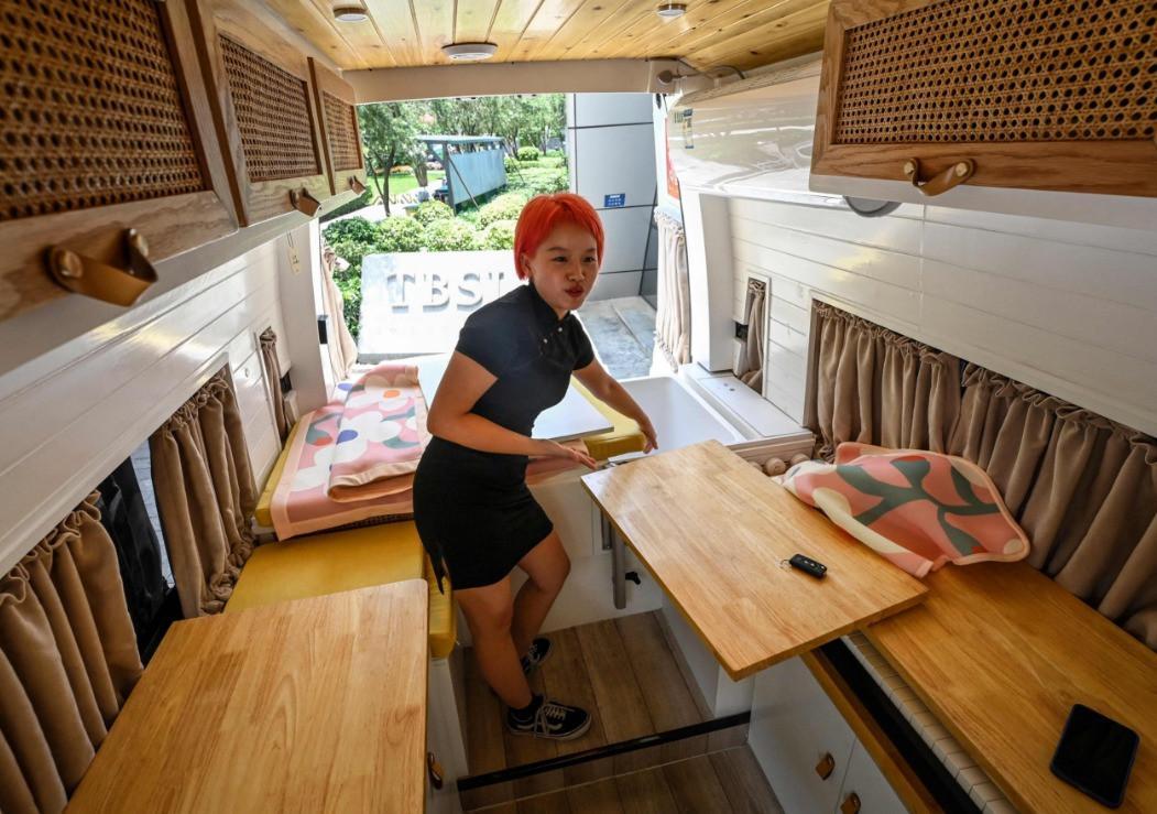Housing prices drive young Chinese into RV living