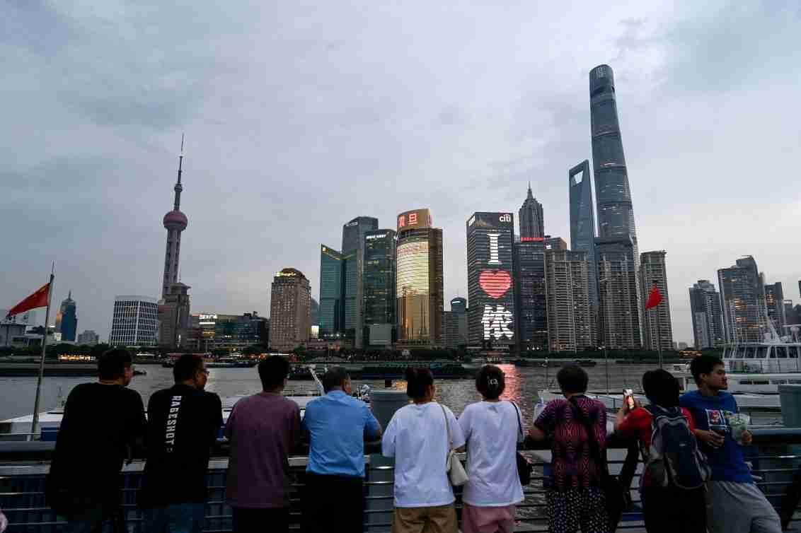 China relaxes visa, urban residency rules to boost economy