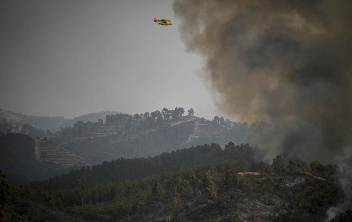 Temperatures soar in Iberia as wildfires force evacuation in Portugal
