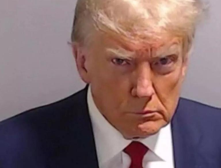 Trump returns to X, posts his mug shot shortly after Georgia surrender