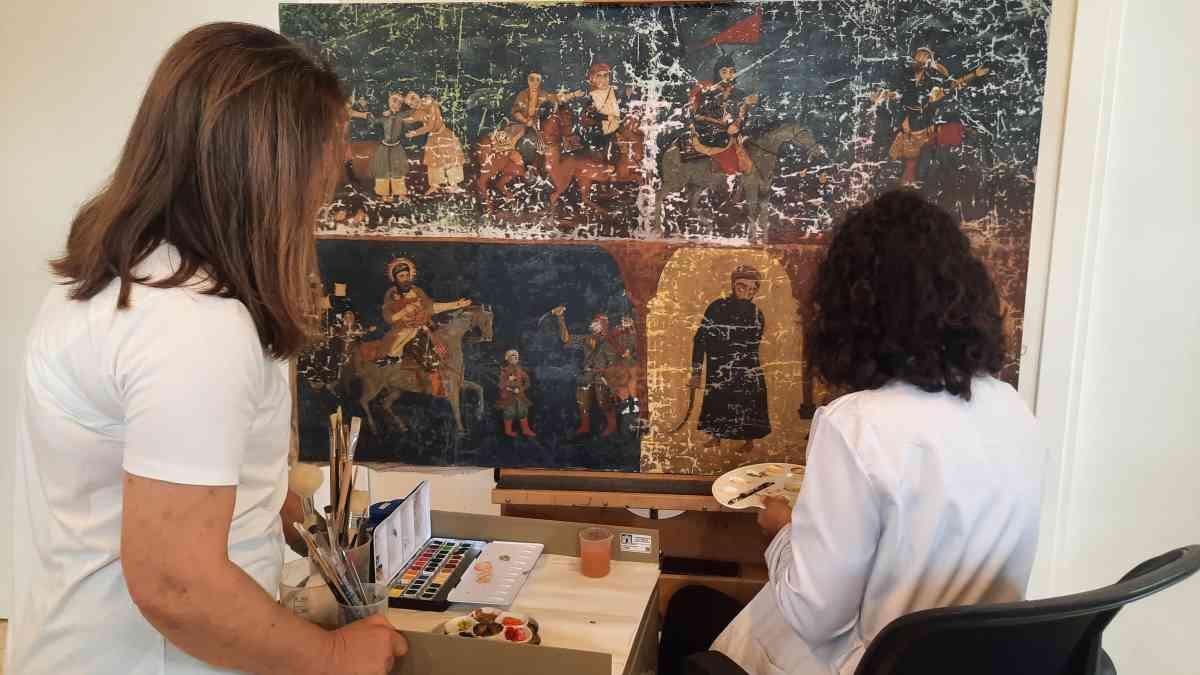 Expert team restores damaged historical artwork