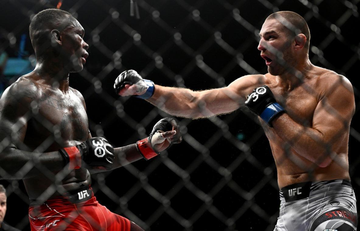 Strickland stuns Adesanya to win UFC title