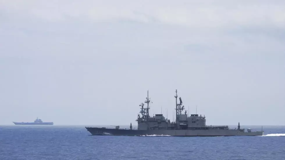 Taiwan says Chinese warplanes join carrier in Pacific drills
