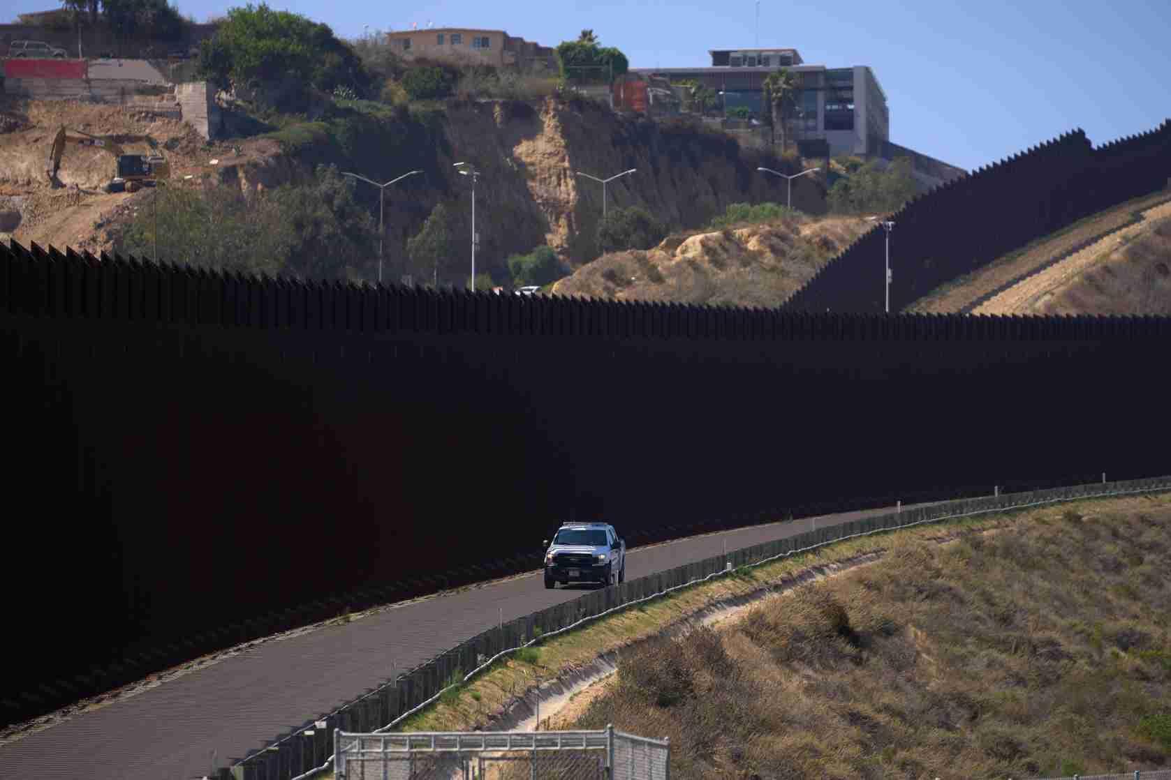 Biden to build more Mexico wall, says hands were tied