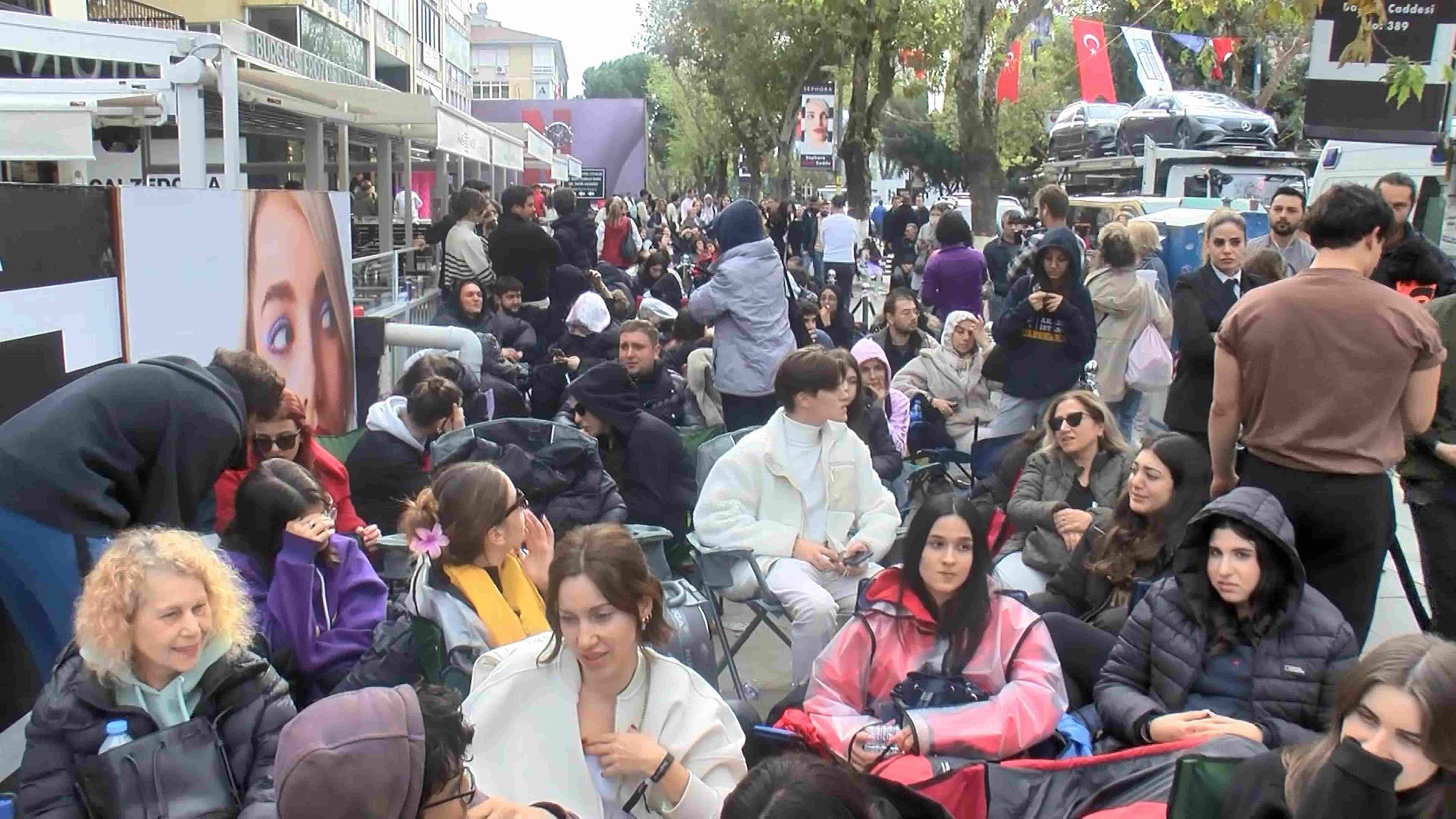 Hundreds queue for opening of famous cosmetics store