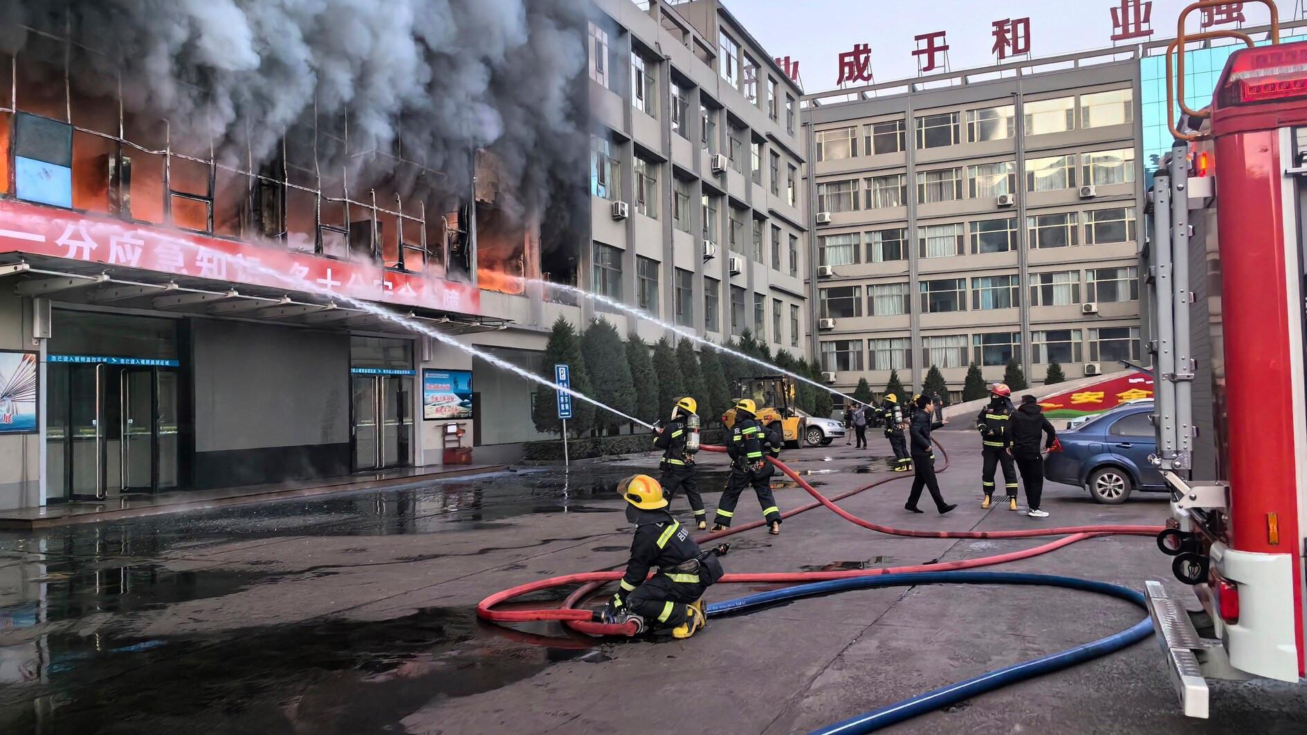 Fire at China coal firm office kills 26