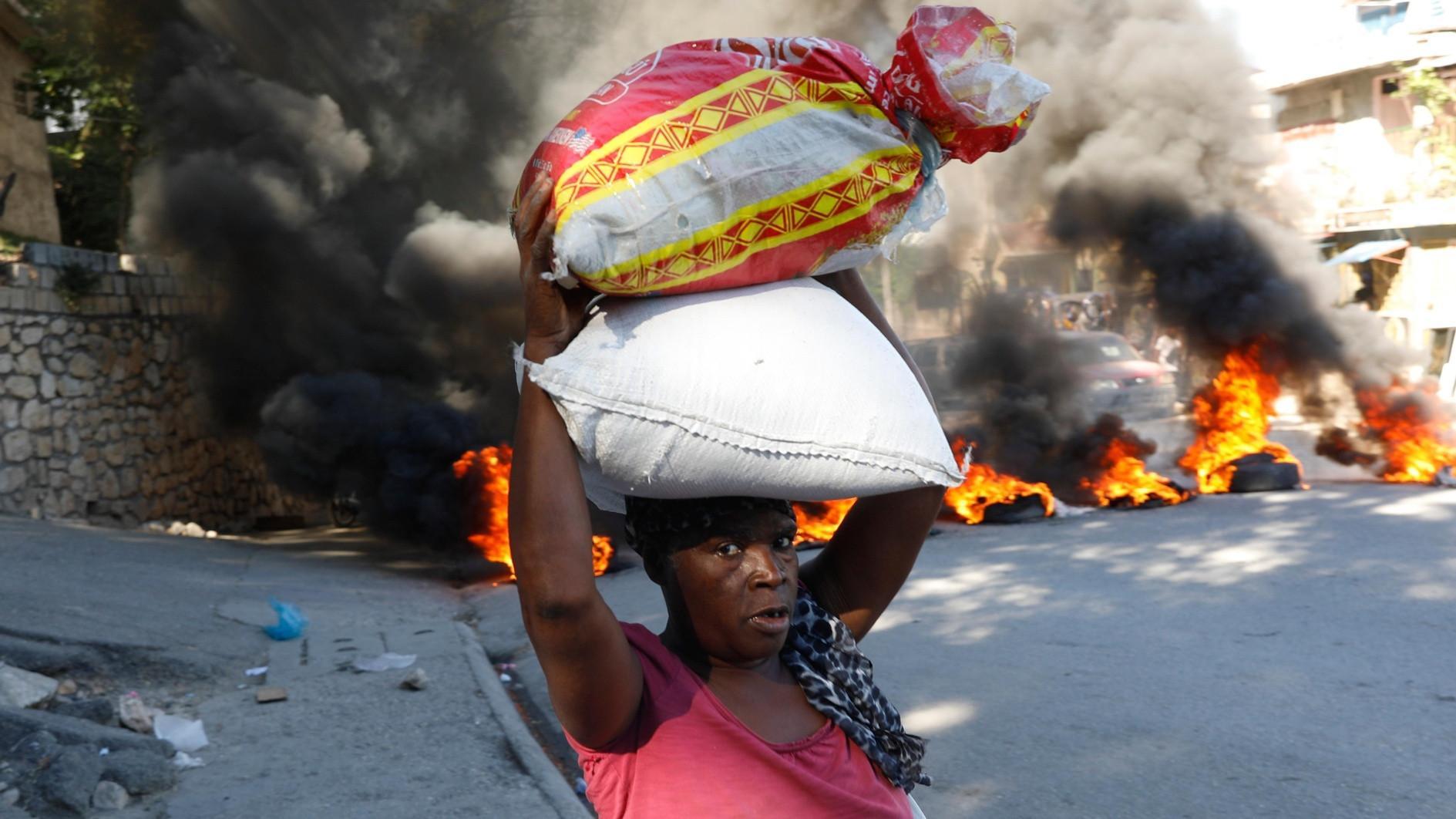 Gang fighting, demonstrations rock Haiti