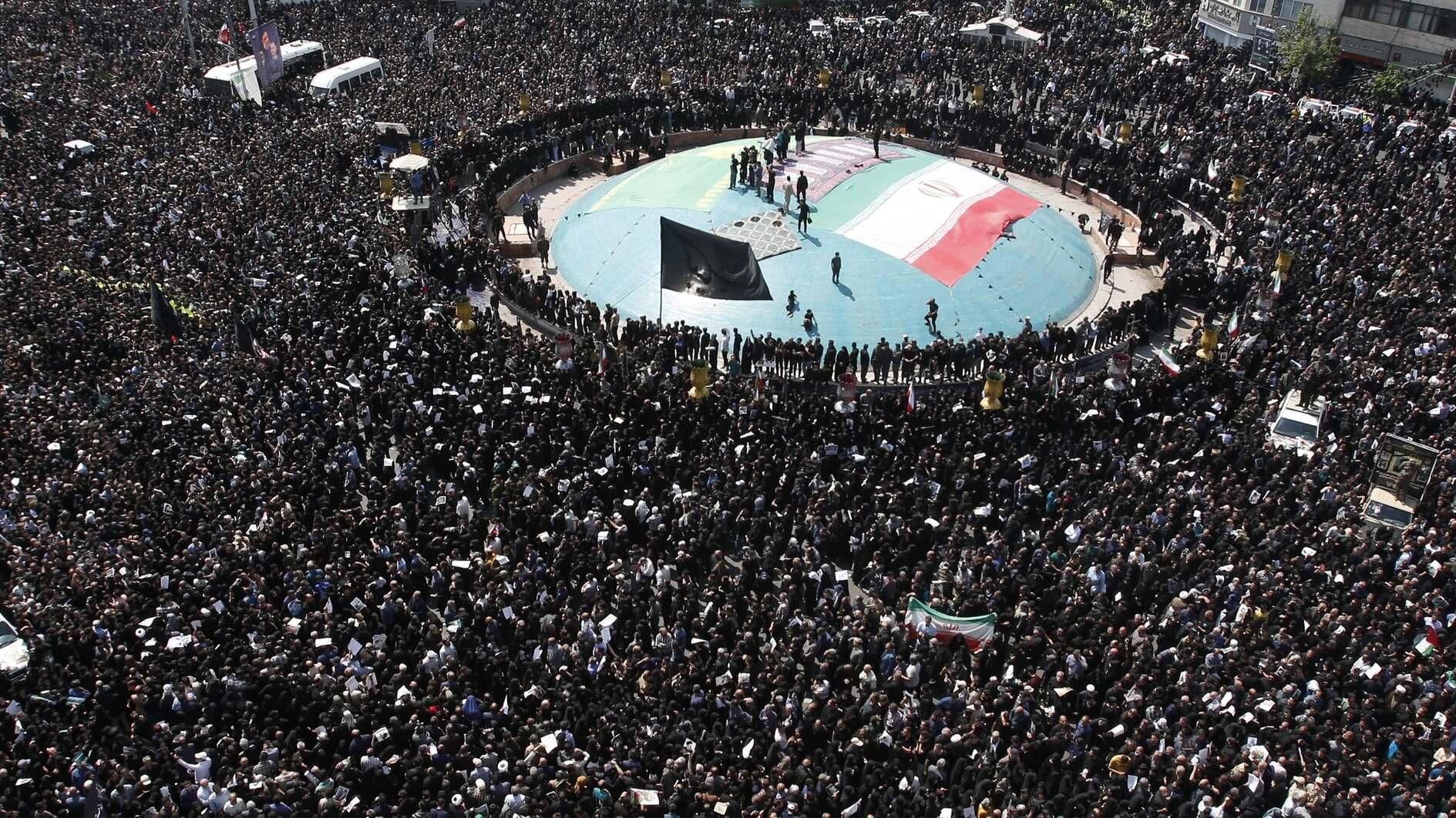 Tens of thousands gather for Raisi funeral procession in Tehran