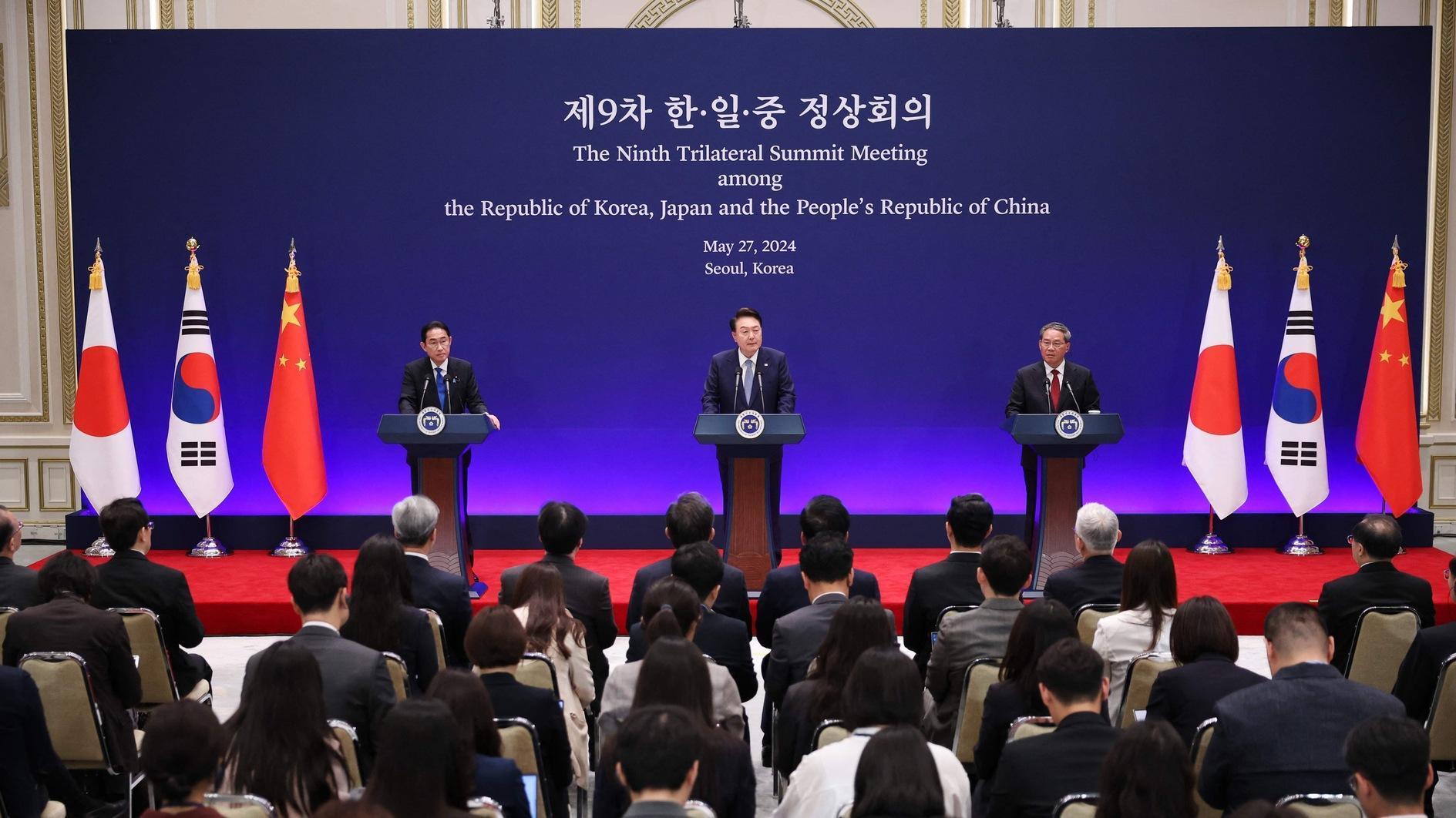 South Korea, China, Japan vow to ramp up cooperation in rare summit
